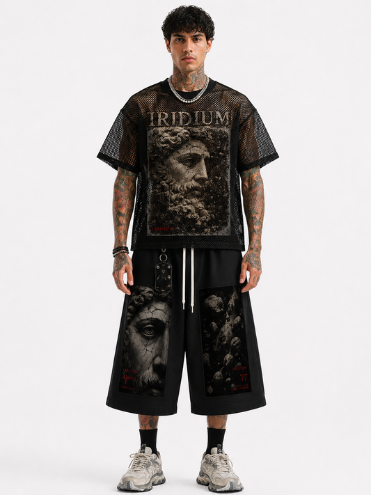 Model wearing The Oracle black boxy mesh T-shirt with Iridium graphic