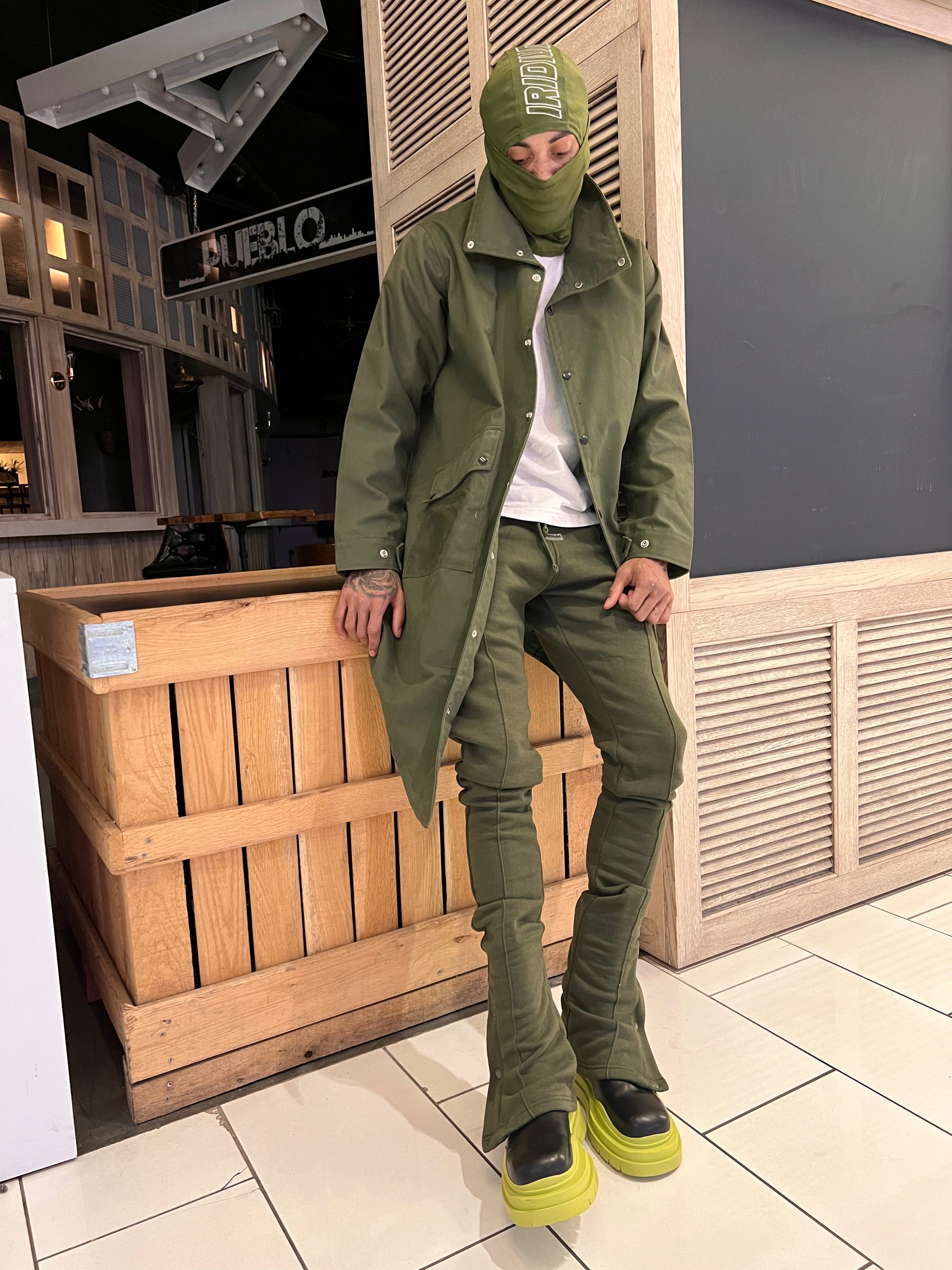 Full front view of a model wearing Iridium Green Stacked Joggers